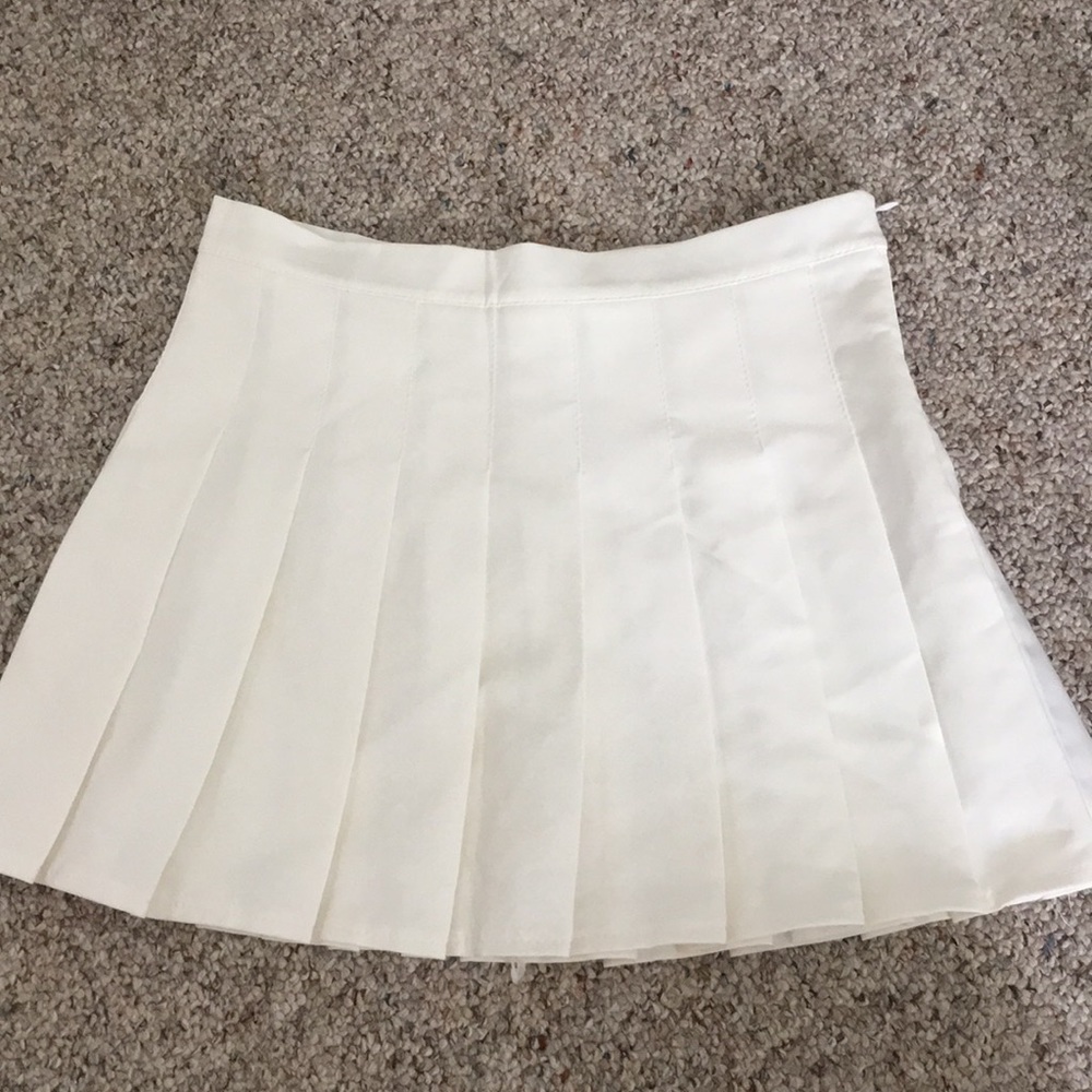 white pleated skirt